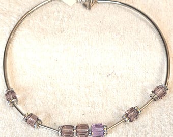 Necklace, 7 SWAROVSKI  Crystals 12 Sarovski rondells, and silver plated tubes. Decorative (Floral) clasp. 16.5" length. FREE shipping.