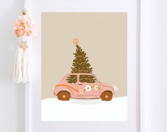 May include: A pink vintage car with a Christmas tree on top, decorated with white flowers and a peace sign. The car is driving through a snowy landscape.