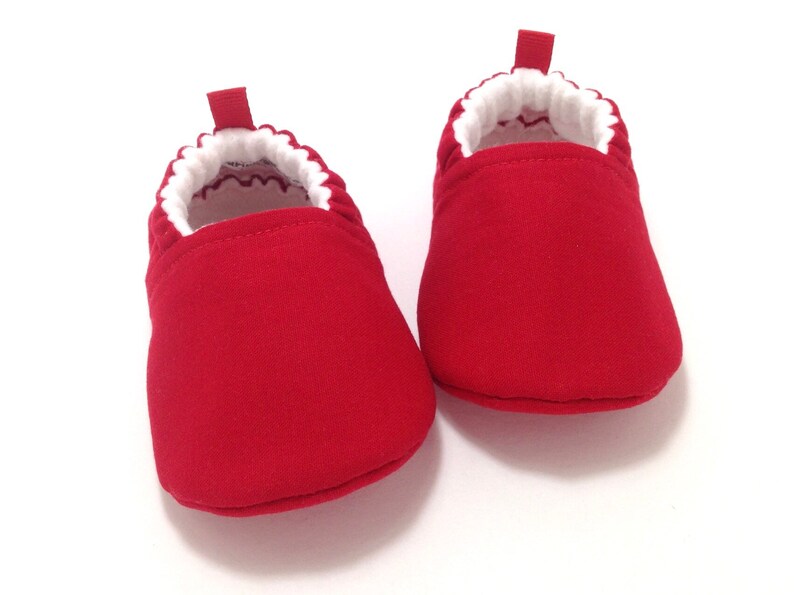 red baby slippers