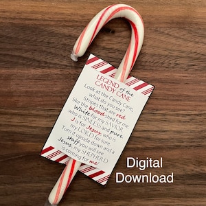 May include: A red and white candy cane with a printable tag that reads "LEGEND of the CANDY CANE" and explains the meaning of the candy cane's colours. The tag says "Look at the Candy Cane, what do you see? Stripes that are red like the blood shed for me. White for my SAVIOR who is SINLESS and pure. J is for Jesus, who is my LORD for sure. Turn it upside down and a staff you will see Jesus, my SHEPHERD is coming for me!"
