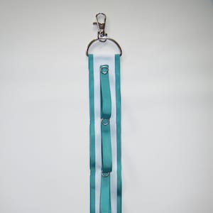 Cheer bow holder for backpacks and cheer bags, cheer bows, bow organizer, cheerleading bows, cheerleading accessories, cheer bow display