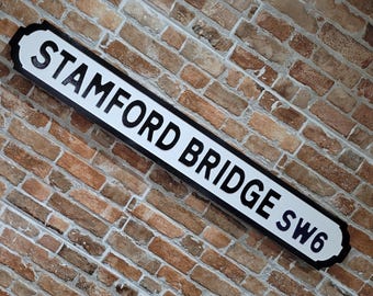Letrero callejero antiguo de hierro fundido falso de Stamford Bridge