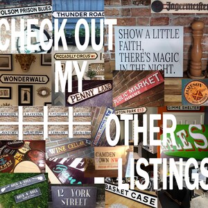 May include: A collage of various signs and decorative items, including street signs, bar signs, and inspirational quotes. The signs feature text like "Folsom Prison Blues," "Thunder Road," and "Penny Lane." The image also includes the text "Check Out My Other Listings."