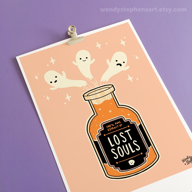 May include: A peach-colored print with three cartoon ghosts flying into a glass bottle filled with orange liquid. The bottle has a black label that reads "100% PURE EXTRACT OF LOST SOULS".