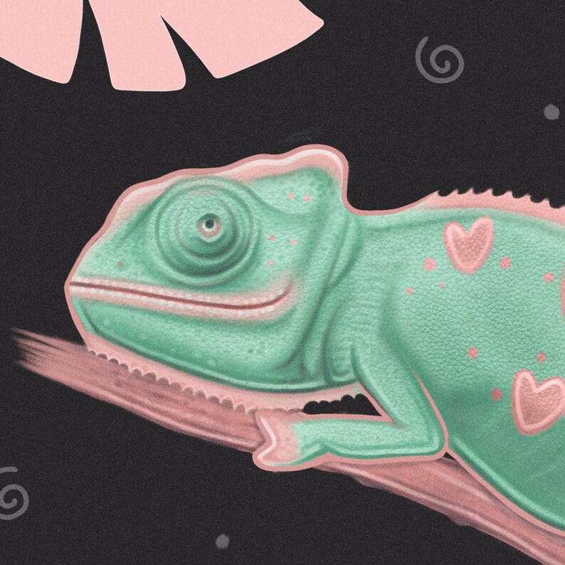 May include: A green chameleon with pink hearts on its back, perched on a pink branch against a black background.