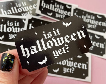 May include: A set of black and white stickers with the text "is it halloween yet?" and a bat graphic.