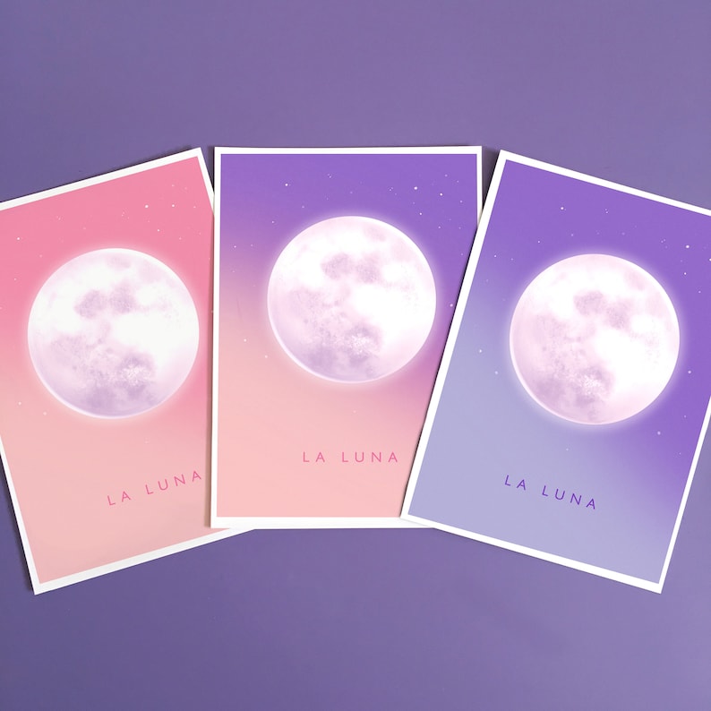 May include: Three prints with a full moon in a pink, orange, and purple gradient sky. Each print has the text "LA LUNA" at the bottom.