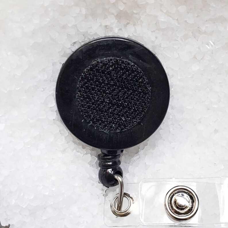 Yellow flowers badge reel