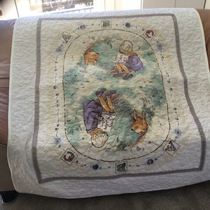 A very rare, unique, out of print panel with Winnie the Pooh and Christopher Robin. Heirloom toddler bed size quilt, blanket nursery decor