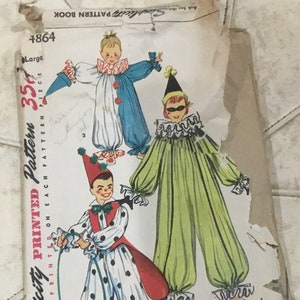 May include: Vintage Simplicity sewing pattern for a clown costume. The pattern is for a large size and includes three different clown designs. The pattern is printed on a white background with black text and illustrations.