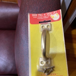 Door Pull / Sash Lift Handle Drawer Brass Plated Metal Sealed Original Packaging 3 3/8" on center w 4 screws Vintage Made in Ohio USA