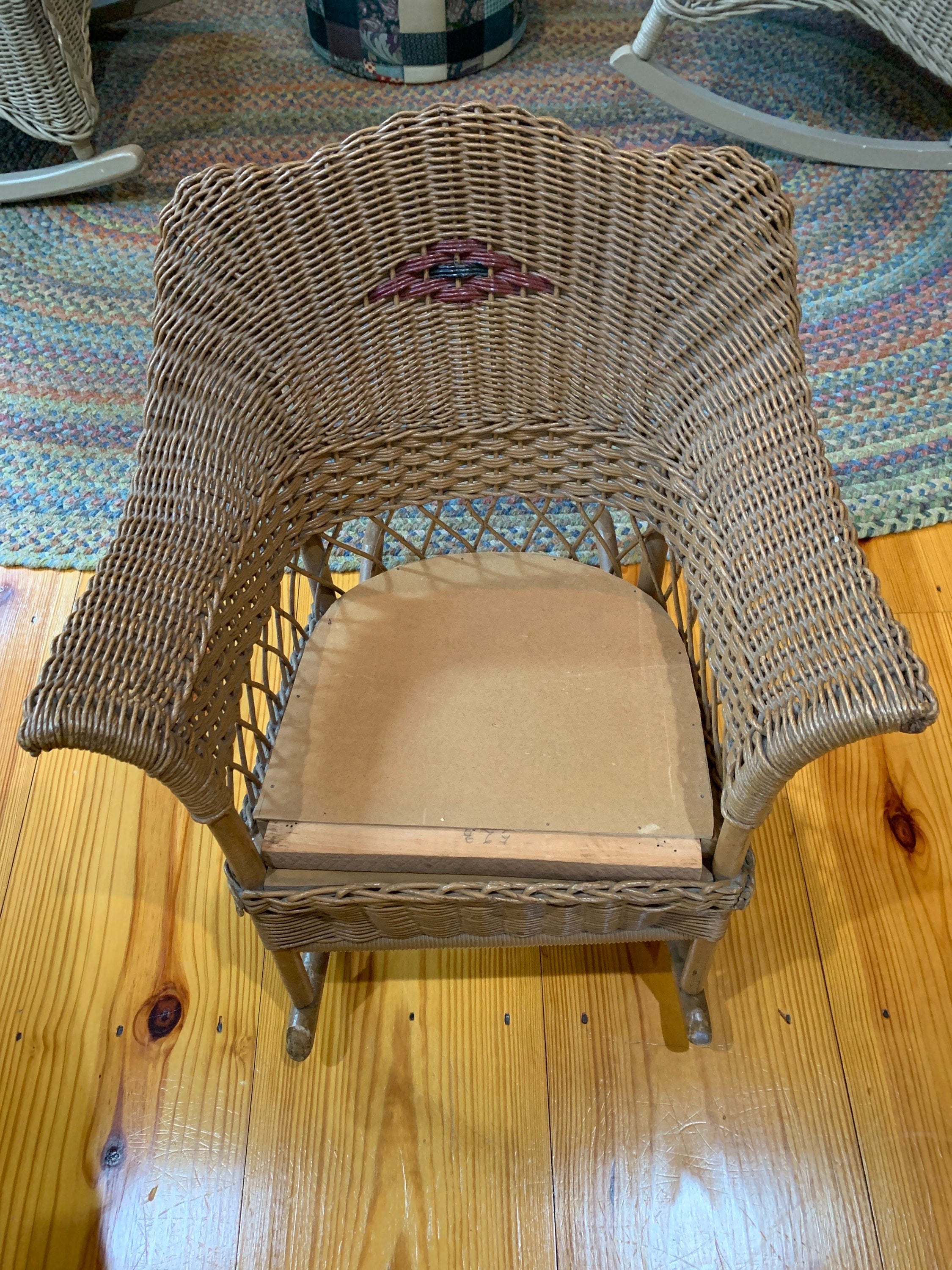 Antique wicker chair with cheap springs