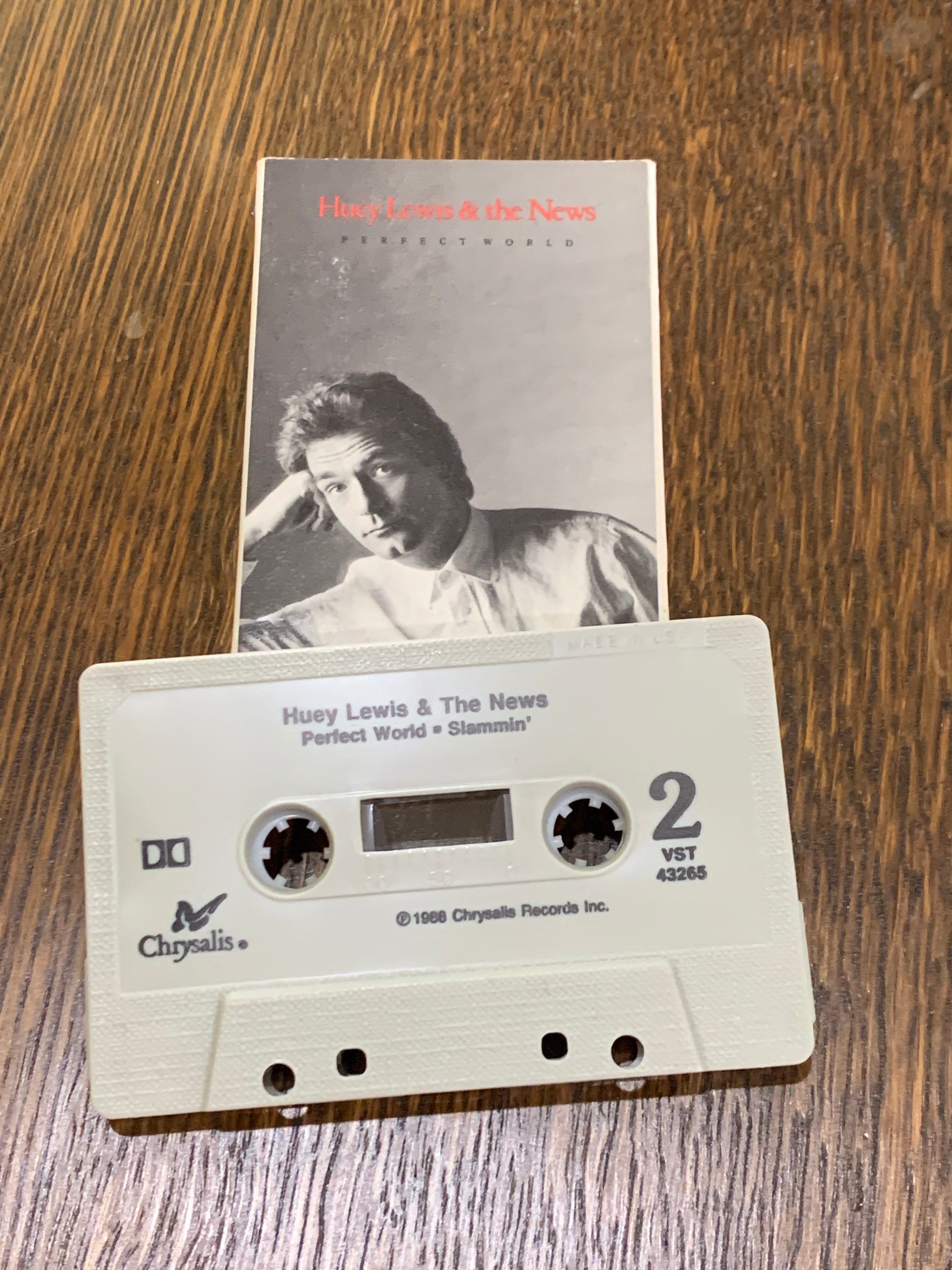 Huey Lewis And The News: Perfect World: Cassette Single Huey Lewis And The News: Perfect World: Cassette Single
