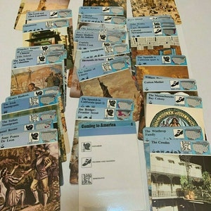 May include: A set of colorful cards with images and text about the history of immigration to America. The cards feature historical figures, events, and locations related to the arrival of different groups of people in the United States.