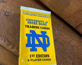 first edition notre dame trading cards Dragonite Vstar