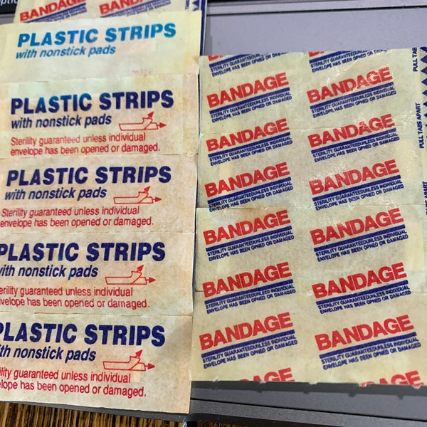 Assorted LOT "Bandages" "Plastic Strips" About 12 Very Old Small bandages in wrappers before Band-aids Adhesive Bandages Advertise Decor