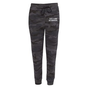 May include: Black and gray camouflage sweatpants with a drawstring waist and a white text design that says "TEXT/LOGO DESIGN HERE".