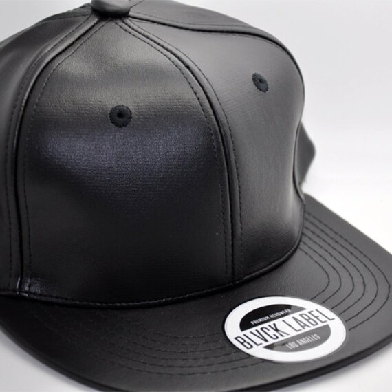 black leather strapback hat