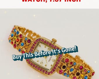 Reloj de cuarzo con cristal de rubí: pulsera con bisel recubierto de oro