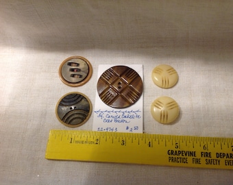 Five Art Deco buttons, 1930s, celluloid and Bakelite