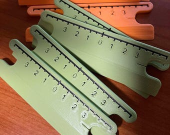 Small shuttle with ruler