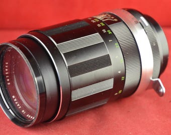 Teleobjetiva Auto Miranda 135 mm 2.8 para câmera Miranda com estojo.