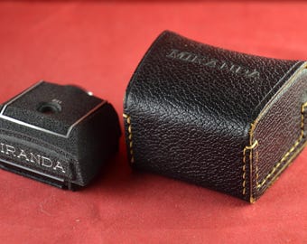 Visor de aumento Miranda de 5x e 15x para uso ao nível dos olhos, incluso.