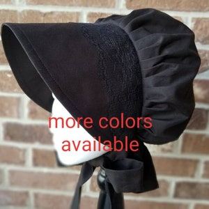 May include: A black bonnet with a gathered crown and a lace trim. The bonnet has a long tie that can be tied under the chin.  More colors available.