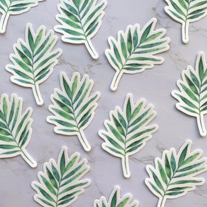 May include: A set of 10 green palm leaf stickers. The stickers are watercolour-style and have a white background.