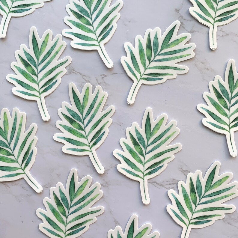 May include: A set of 10 green palm leaf stickers. The stickers are watercolour-style and have a white background.