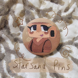 Botão de alfinete Shelly Starsand