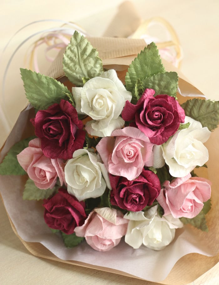 Handmade pink and ivory paper rose bouquet for a first wedding anniversary