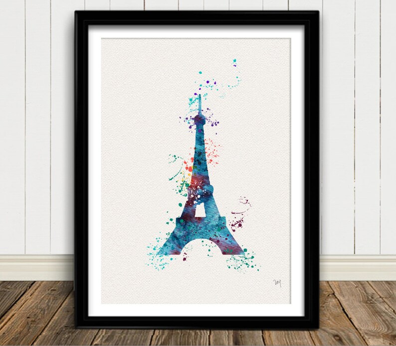 Puede incluir: Una pintura de acuarela de la Torre Eiffel en tonos de azul, verde y morado. La torre est&aacute; rodeada de salpicaduras de pintura de colores.