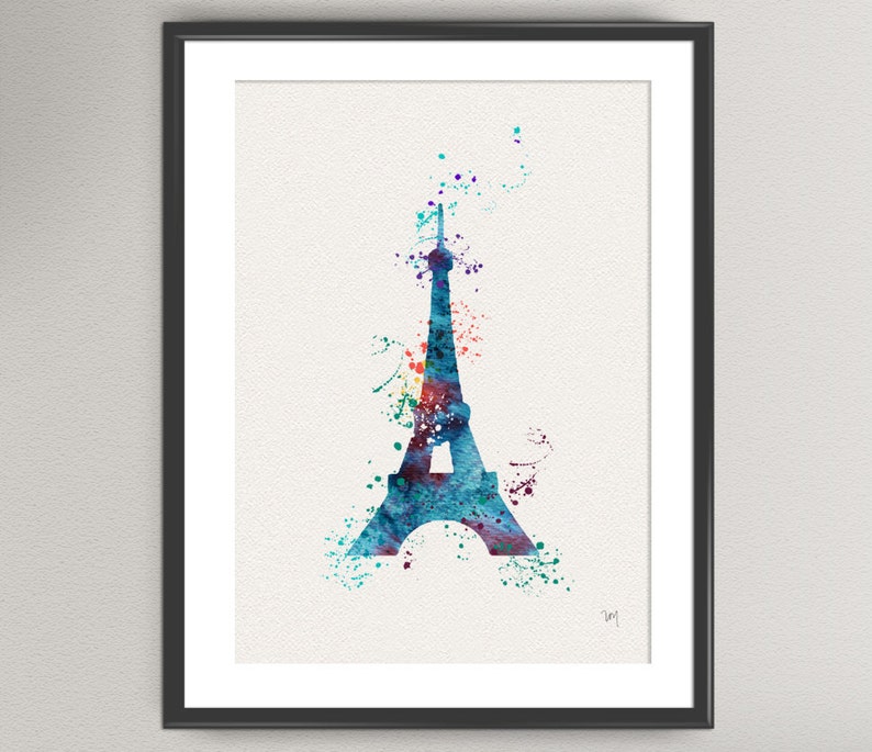 Puede incluir: Una pintura de acuarela de la Torre Eiffel en tonos de azul, verde y morado. La torre est&aacute; silueteada sobre un fondo blanco con salpicaduras de color.