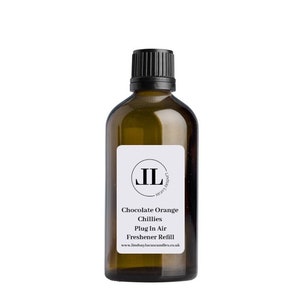 May include: A brown glass bottle with a black cap and a white label. The label has a black circle with the letters "JL" inside. The text on the label reads "Chocolate Orange Chillies Plug In Air Freshener Refill www.lindsaylucascandles.co.uk"