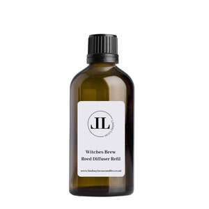 May include: A brown glass bottle with a black lid and a white label. The label has a black circle with the letters "JL" inside. The text on the label reads "Witches Brew Reed Diffuser Refill" and "www.lindsaylucascandles.co.uk".