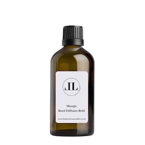 May include: A brown glass bottle with a black cap and a white label. The label has a black circle with the letters "JL" inside. The text on the label reads "Mango Reed Diffuser Refill" and "www.lindsaylucascandles.co.uk".