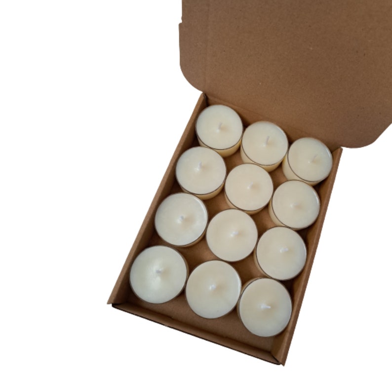 box of 12 round white scented tea light candles made with soy wax