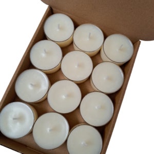 box of 12 round white scented tea light candles made with soy wax