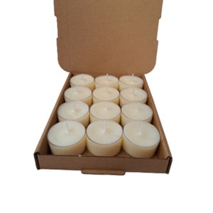 box of 12 round white scented tea light candles made with soy wax