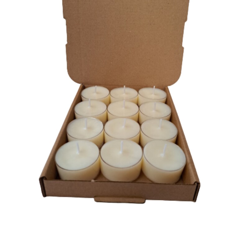 box of 12 round white scented tea light candles made with soy wax