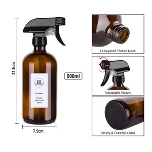 May include: Amber glass spray bottle with a black trigger and label. The bottle is 21.5cm tall and 7.5cm wide, with a 500ml capacity. Features include an adjustable nozzle, leak-proof thread neck, and sturdy glass. The label reads "Be Rouge Ironing Anti Crease Spray".