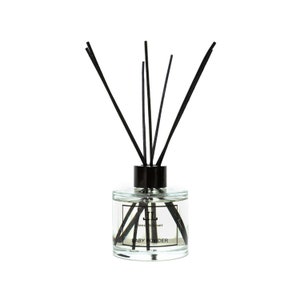 May include: A clear glass bottle with black reeds and a black lid. The bottle contains a clear liquid and has a label that reads "Reed Diffuser Baby Powder".