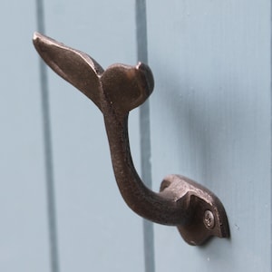 Wale tail bathroom hook for nautical, coastal, seaside or pirate theme decor, wall hook for towels or clothes in the shape of a fish tail