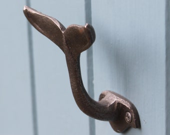 Wale tail bathroom hook for nautical, coastal, seaside or pirate theme decor, wall hook for towels or clothes in the shape of a fish tail