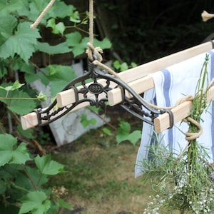 Clothes drying pulley-maid laundry hanging rack for indoors drying and sustainable living, old-fashion traditional clothes and drying airer