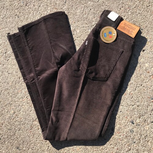 Vintage 1980’s deadstock USA olympics Levi 517 brown corduroy pants tagged shops 31x34