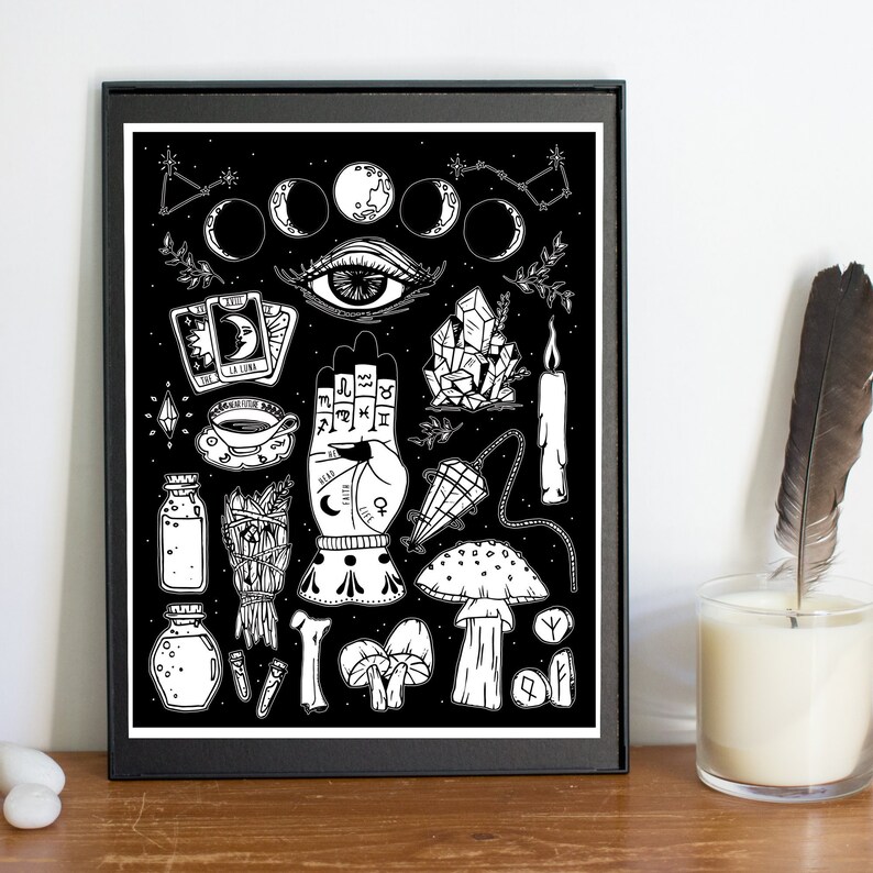 May include: Black and white illustration of various witchcraft and occult symbols on a black background. The illustration includes a hand with astrological symbols, a crescent moon, a crystal, a candle, a mushroom, and a tarot card.
