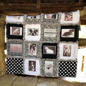 May include: A black and white quilt with a patchwork design featuring various dog photos and a quote about dogs. The quilt has a ruffled edge and is made of a soft, fuzzy fabric.