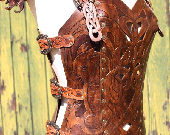 Leather armor corset and bracers! Viking celtic owl cut-out design in heavy duty leather. Buy together and SAVE! Now in two-tone Dark Brown!